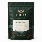 Aldera whole bean coffee in a custom printed stand-up pouch with squared top corners and a wide bottom gusset
